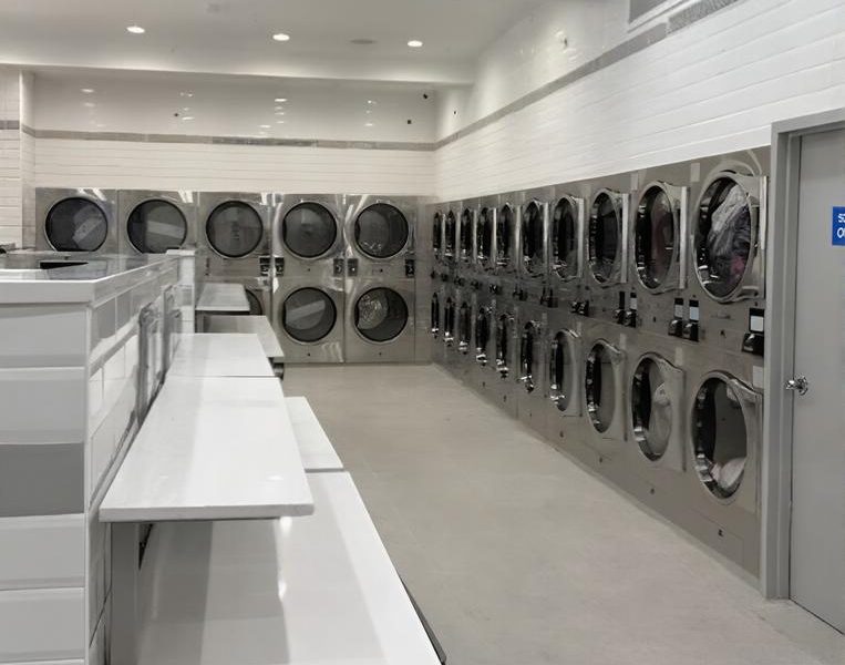Interior of Metro Laundromat with rows of washers and dryers